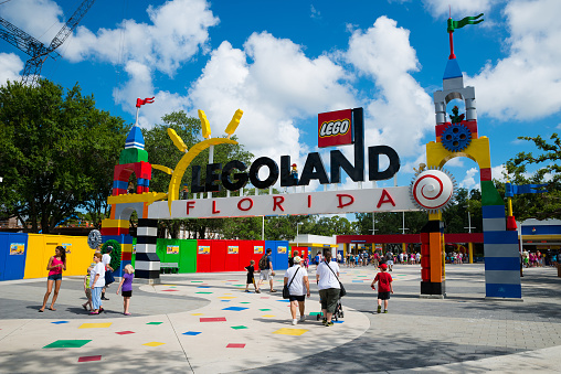 WINTER HAVEN, FL, USA - June 18, 2014: Visitors pass through the entrance to Legoland Florida