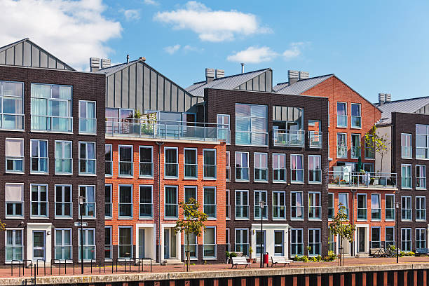 Modern Dutch canal houses Modern Dutch canal houses in the city of Dordrecht dordrecht stock pictures, royalty-free photos & images