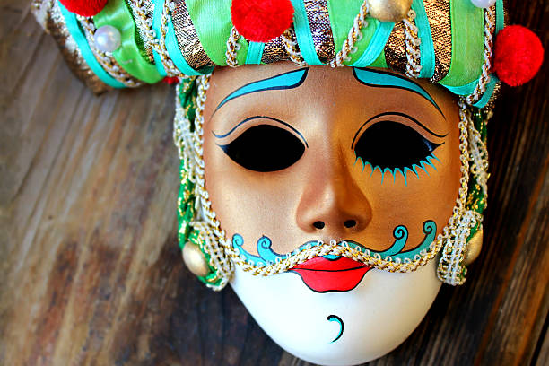 istock Venetian masquerade mask in a red hat 498702777
