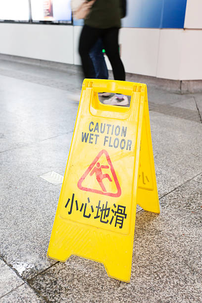 istock Sign showing warning of caution wet floor 498706627