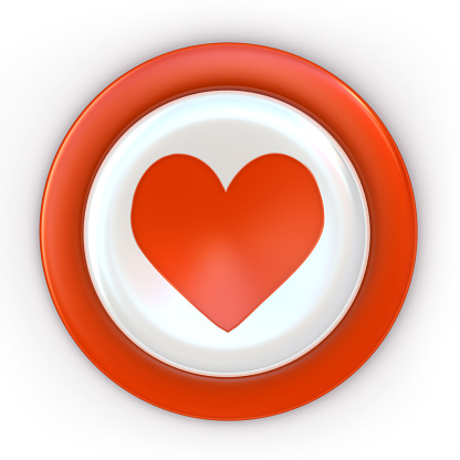 white button with a red symbol of the heart