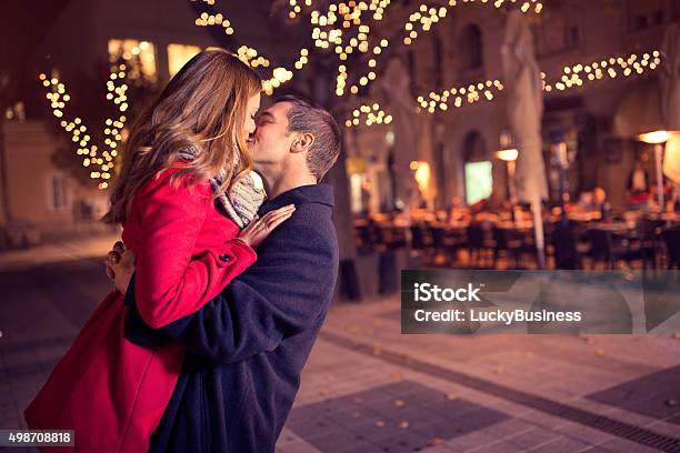 Young Affectionate Couple Kissing Tenderly Stock Photo - Download Image Now - Valentine's Day - Holiday, Kissing, Street