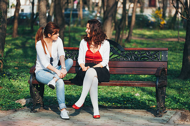 istock Girls on a bench 498710900