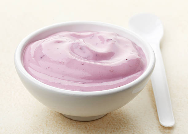 istock bowl of pink blueberry yogurt 498711568