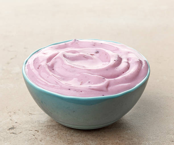 istock bowl of pink blueberry yogurt 498711626