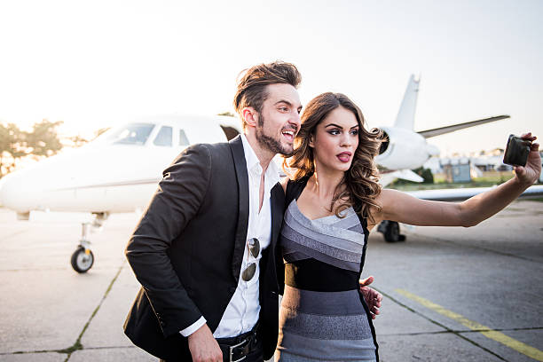 istock Couple making selfie at the airport 498713566