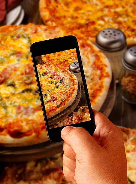 istock Mobile Photography of Spinach and Prosciutto Pizza 498715028