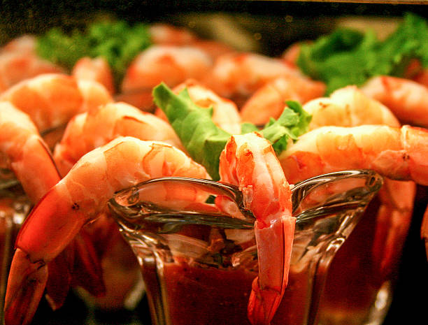 shrimp cocktail rows of shrimp cocktails at a restaurant in California shrimp cocktail stock pictures, royalty-free photos & images