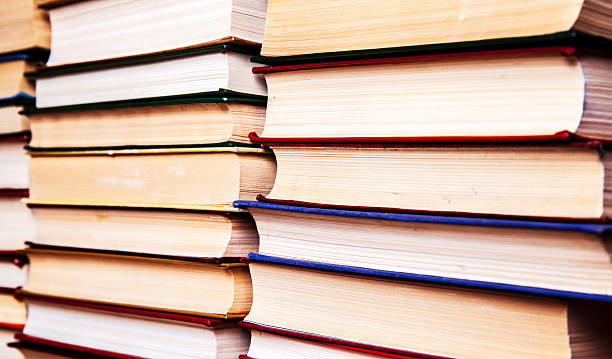 istock Old and used hardback books 498717262