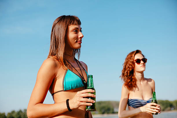 istock Hipster Friends At The Beach 498717844