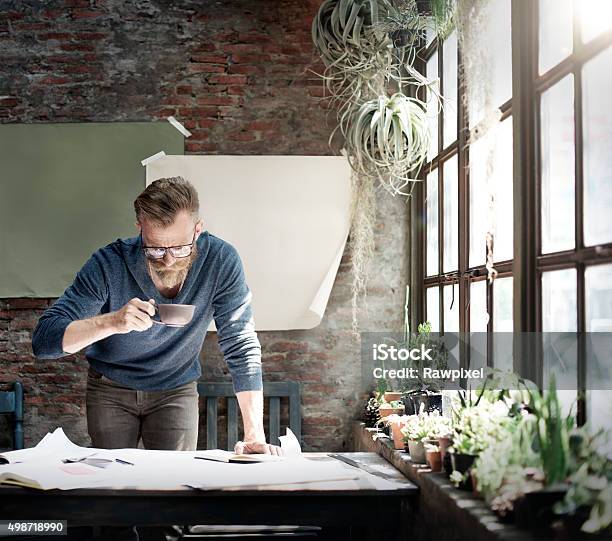 Man Working Determine Workspace Lifestyle Concept Stock Photo - Download Image Now - 2015, Adult, Business