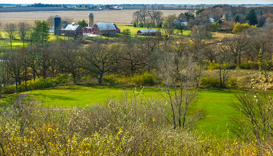 Golf course and farmland in proximity, autumn in northern Illinois, for themes of land use, coexistence, the environment
