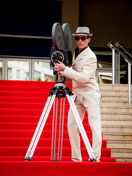 istock Retro styled Camera Man on the Red Carpet 498721388