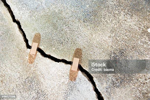 Repairing Stock Photo - Download Image Now - Cracked, Repairing, Stability