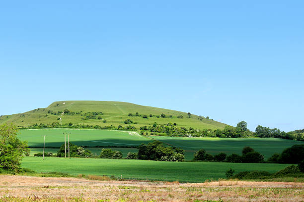 istock Image of steep hill in countryside, with grass, green fields 498729281