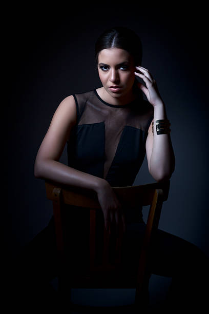 istock Beautiful woman on retro chair 498730091