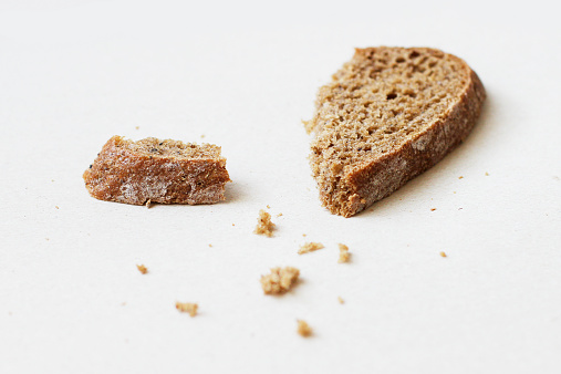 Slices of rye bread and crumbs