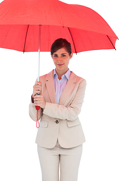 istock Young businesswoman with umbrella 498731585