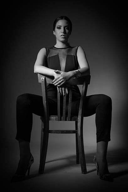 istock Beautiful woman on retro chair 498732387