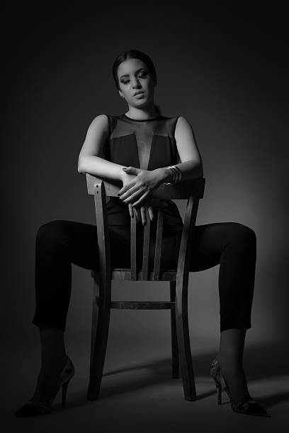istock Beautiful woman on retro chair 498732395