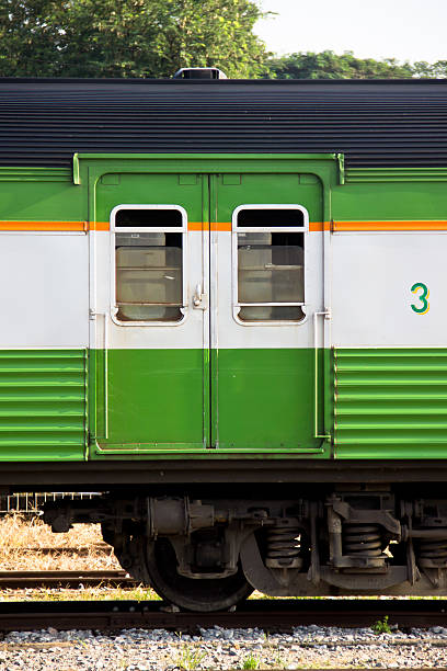 Vintage train wagons door Vintage green train wagons doors in sunny day humphrey bogart stock pictures, royalty-free photos & images