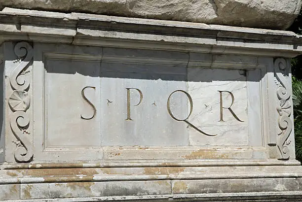 Rome, ancient ROMAN SPQR inscription of the Roman Empire on marble