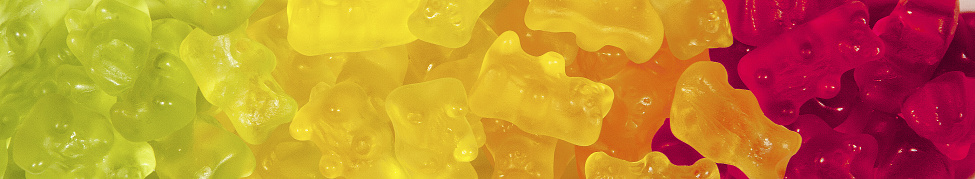 a background of colored gelly bears