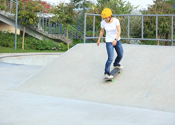 istock skateboarding woman at skatepark 498736358