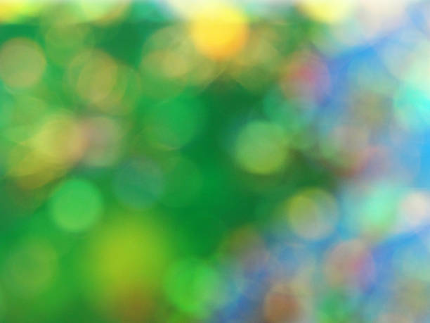 istock abstract background blurry shiny green and blue 498737578