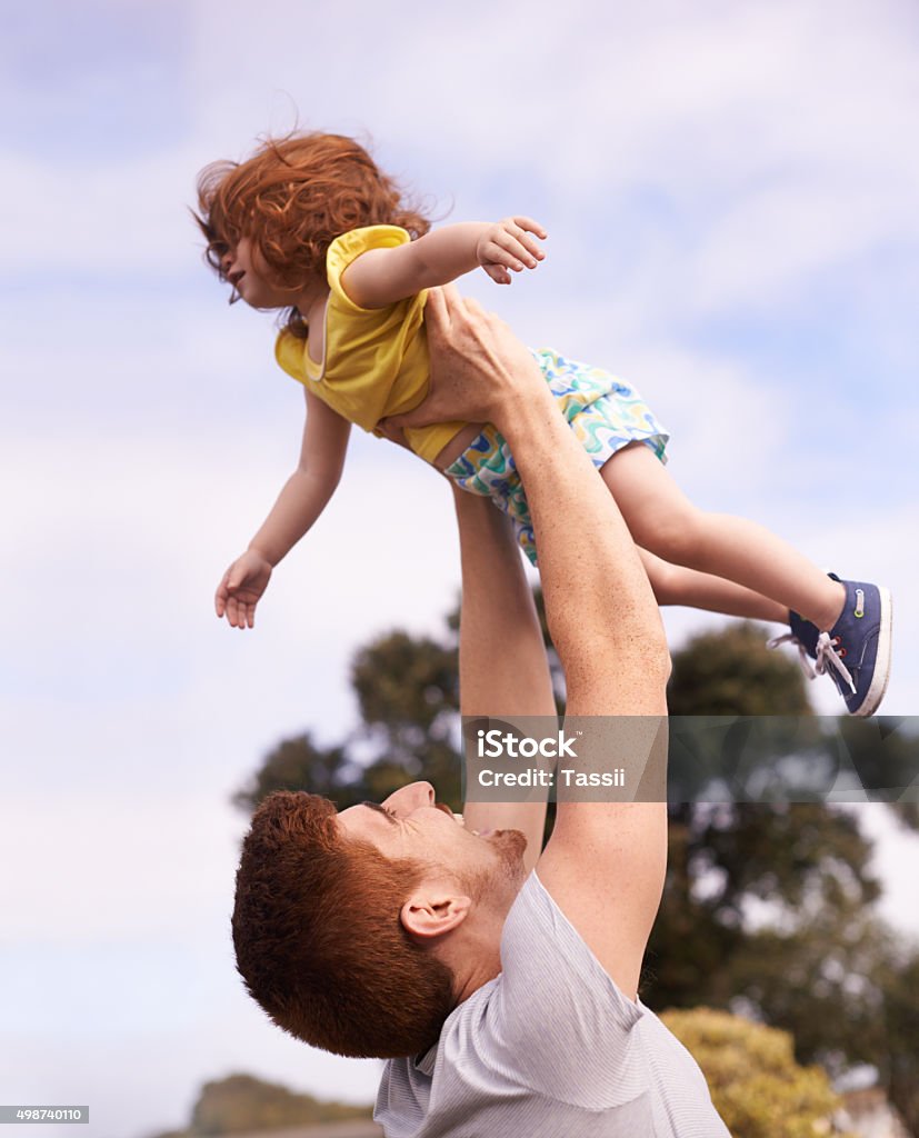 Daughters are delightful Shot of a father lifting his adorable little girl into the airhttp://195.154.178.81/DATA/i_collage/pu/shoots/806003.jpg 12-17 Months Stock Photo