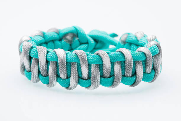 istock Black braided bracelet on white background 498742252