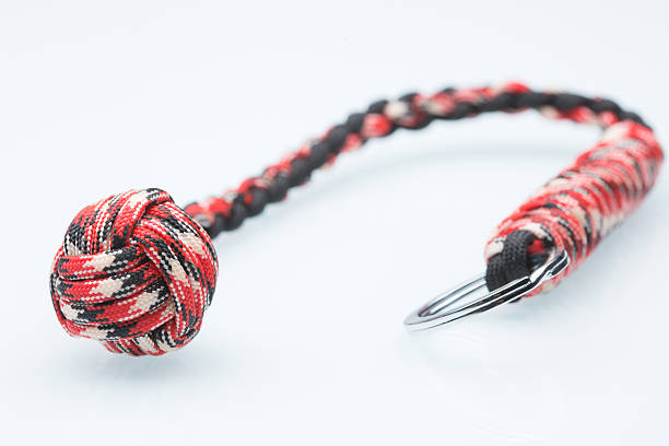 istock braided laces keychain. bludgeon for self-defense. white background 498742414
