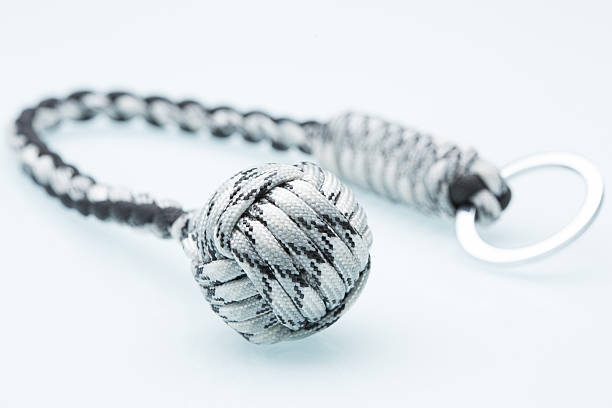 istock braided laces keychain. bludgeon for self-defense. white background 498742480
