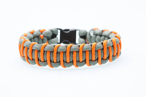 istock Black braided bracelet on white background 498742596