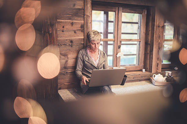 istock Senior woman work on laptop 498747092