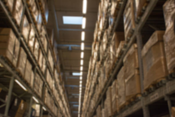 istock Abstract blurred boxes on rows of shelves 498747922