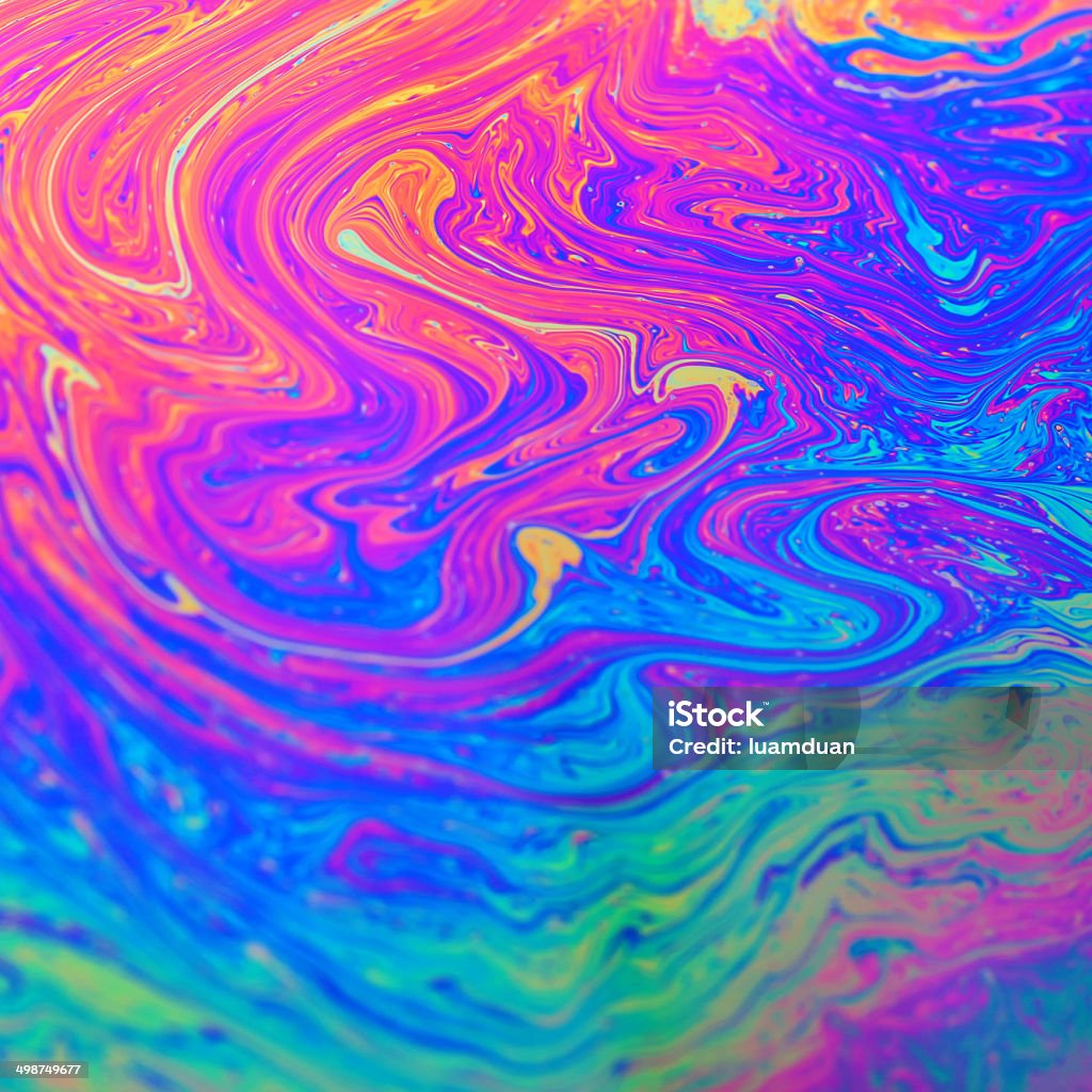 Rainbow colors created by soap, bubble, or oil makes Rainbow colors created by soap, bubble, or oil makes can use background Psychedelic Stock Photo