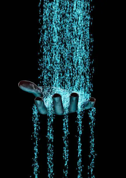 3D render of binary data flowing on to human hand