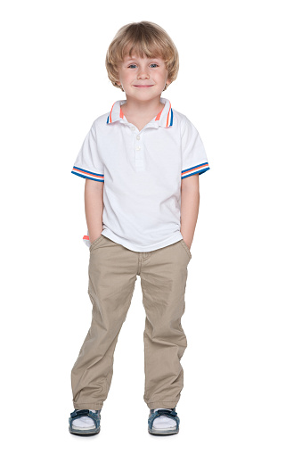 A portrait of a cute preschool boy on the white background