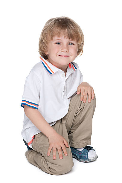 istock Happy preschool boy on the white 498751705