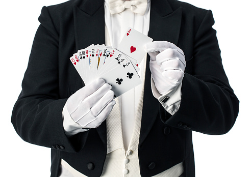 Magician performing trick with cards