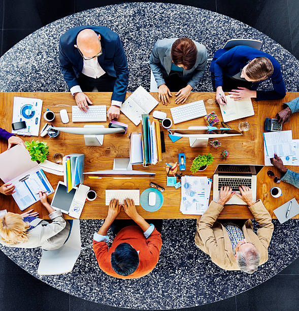 istock Group of Multiethnic Busy People Working in an Office 498753241