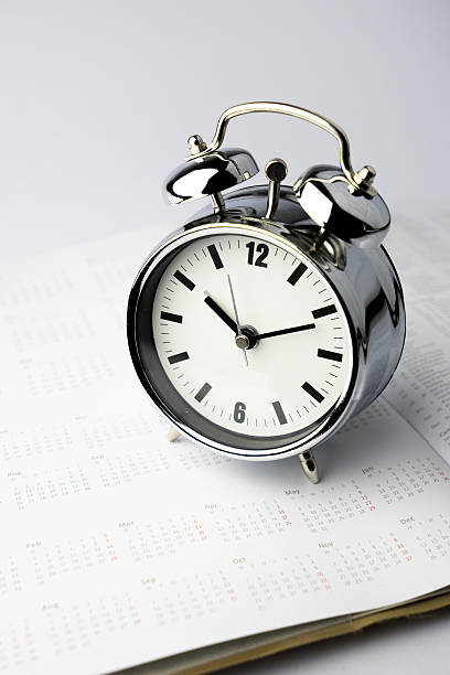 istock Metal Alarm clock, wake up time, on white background 498753451