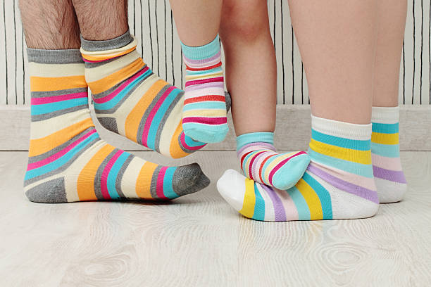 istock family in socks 498753617