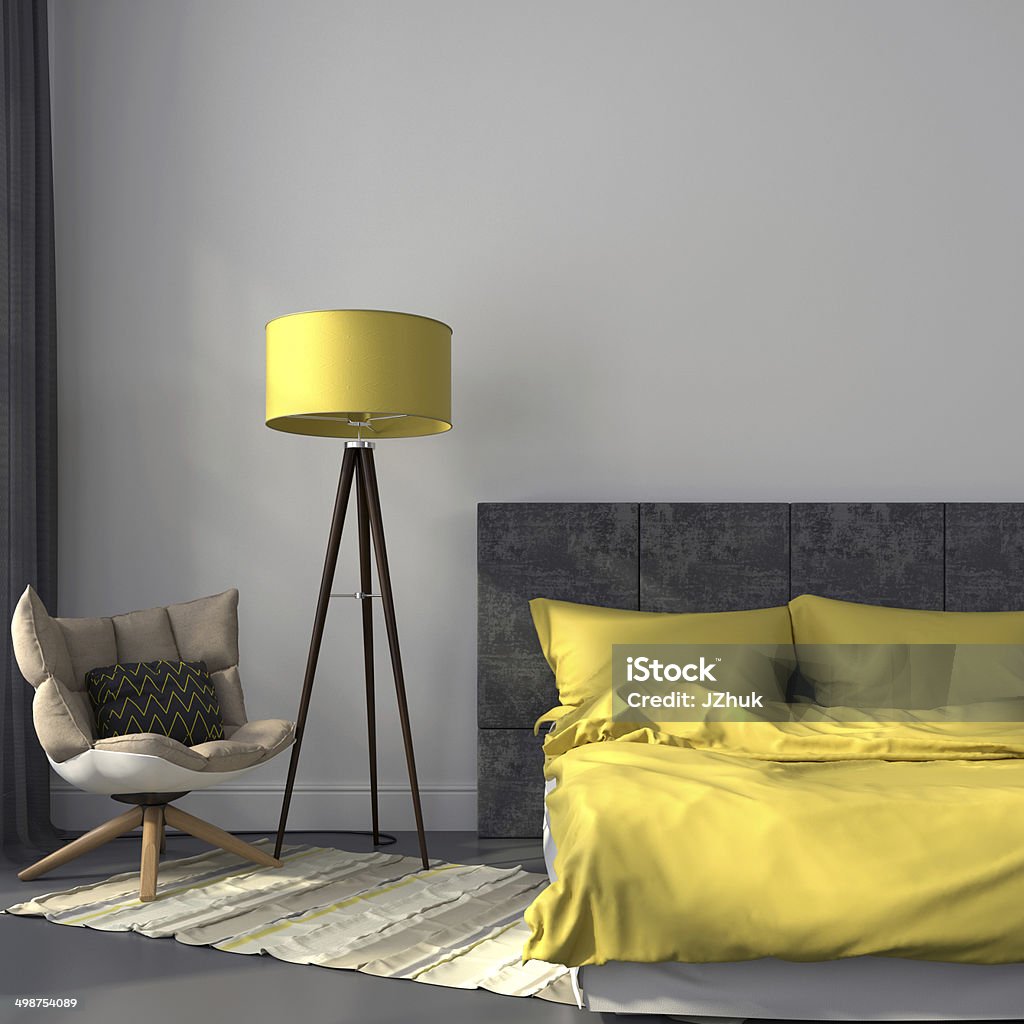 Gray bedroom and yellow decor Modern bedroom in gray color and accents on yellow lamp and bedclothes Yellow Stock Photo