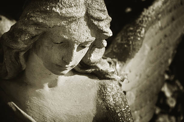istock Beautiful close up af a face angel sculpture 498758402