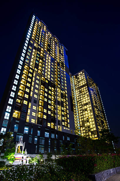 istock night time of condominium 498758444