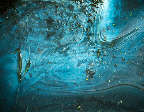 Closeup of watery oil film