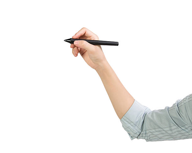 istock Woman hand holding pen writing side view 498759036