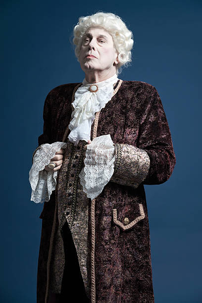 istock Retro baroque man with white wig standing and looking arrogant. 498765305